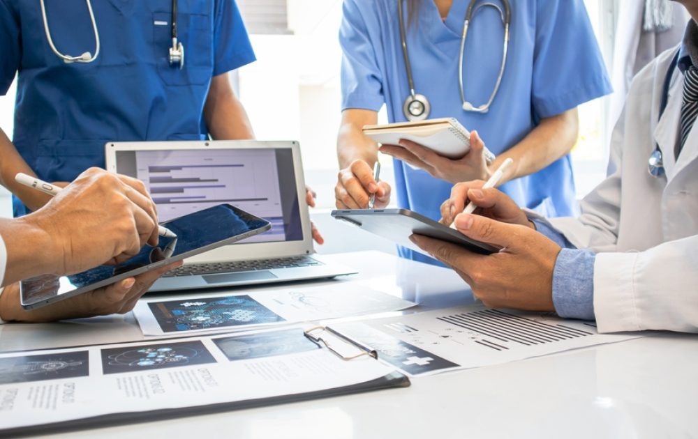 Medical,Team,And,Business,People,Use,Computers,During,Office,Meetings.